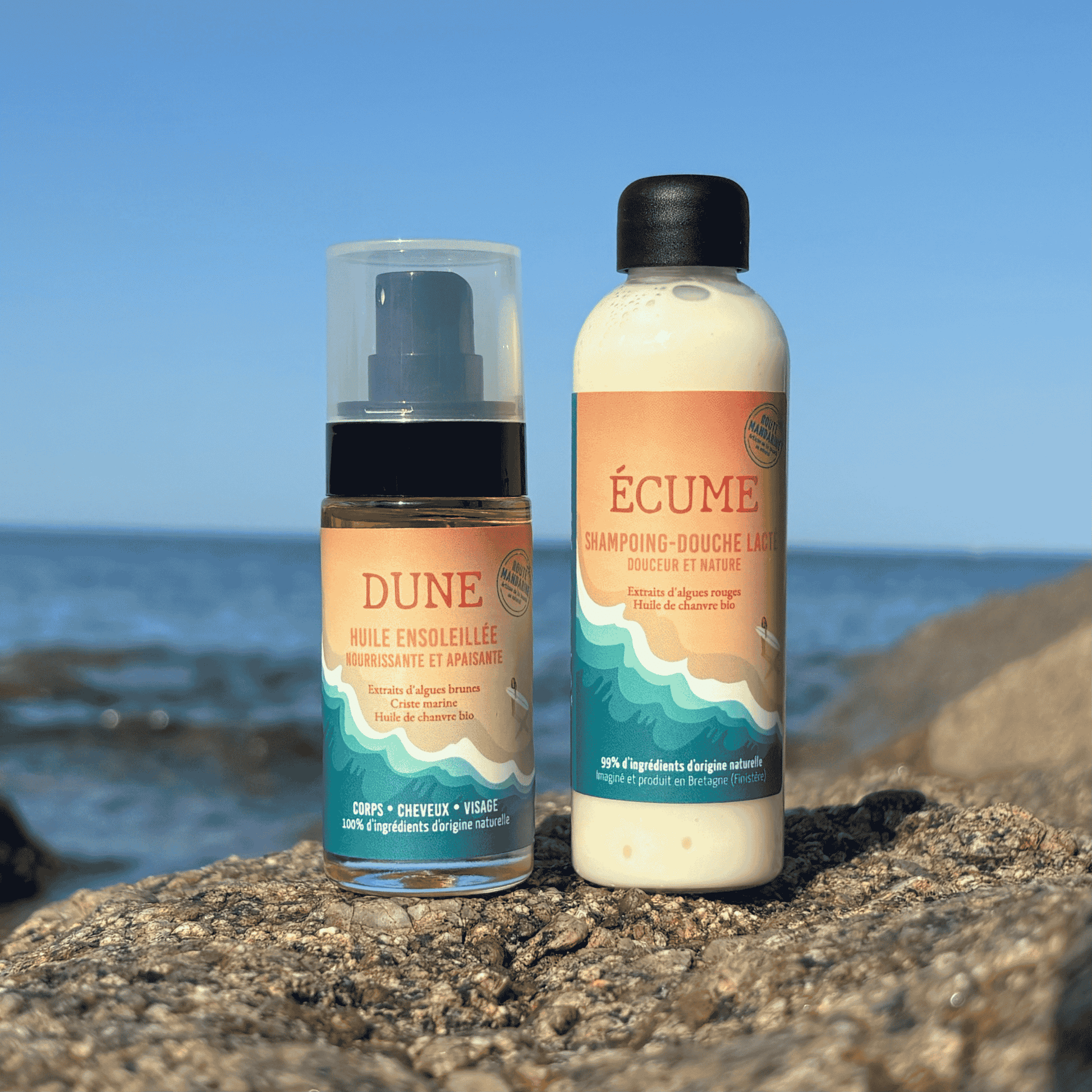 photos des flaçon format voyage de l'huile sèche et du shampoing-douche
