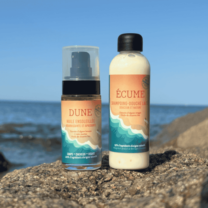 photos des flaçon format voyage de l'huile sèche et du shampoing-douche